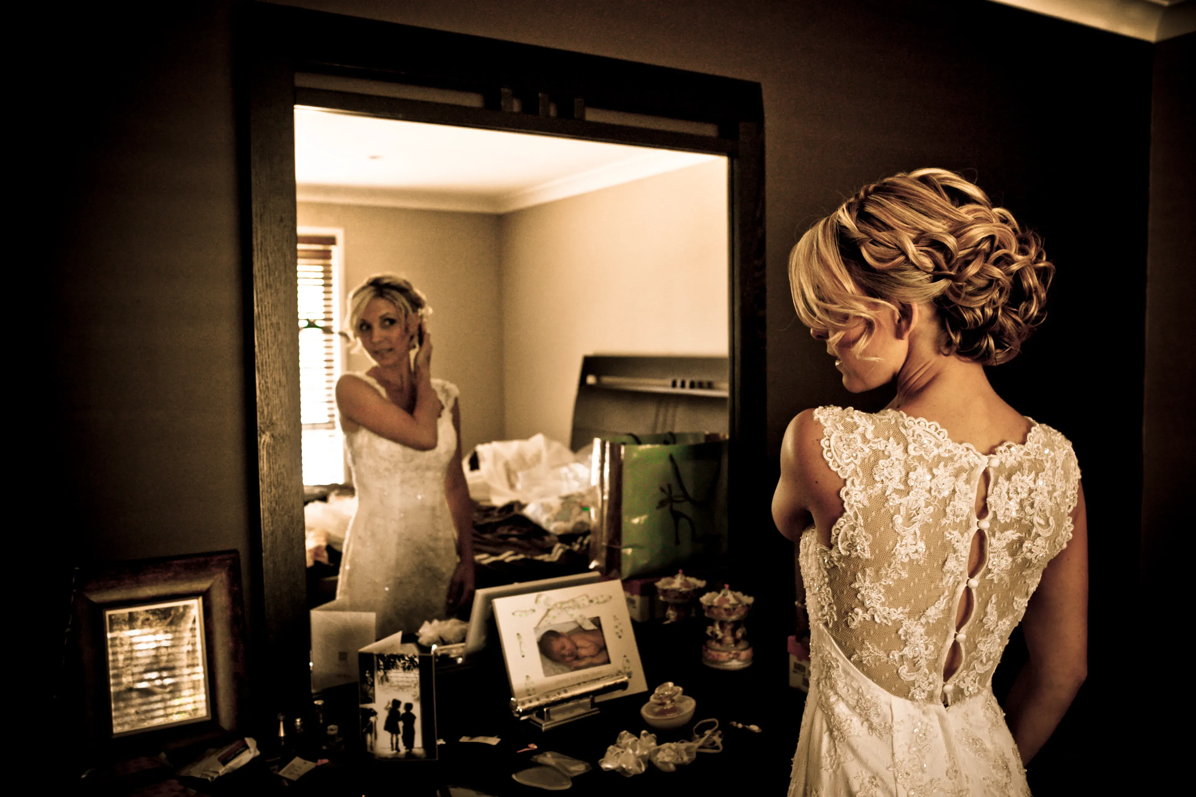 Bridal hair with braid detail and added volume, styled by Bellus
