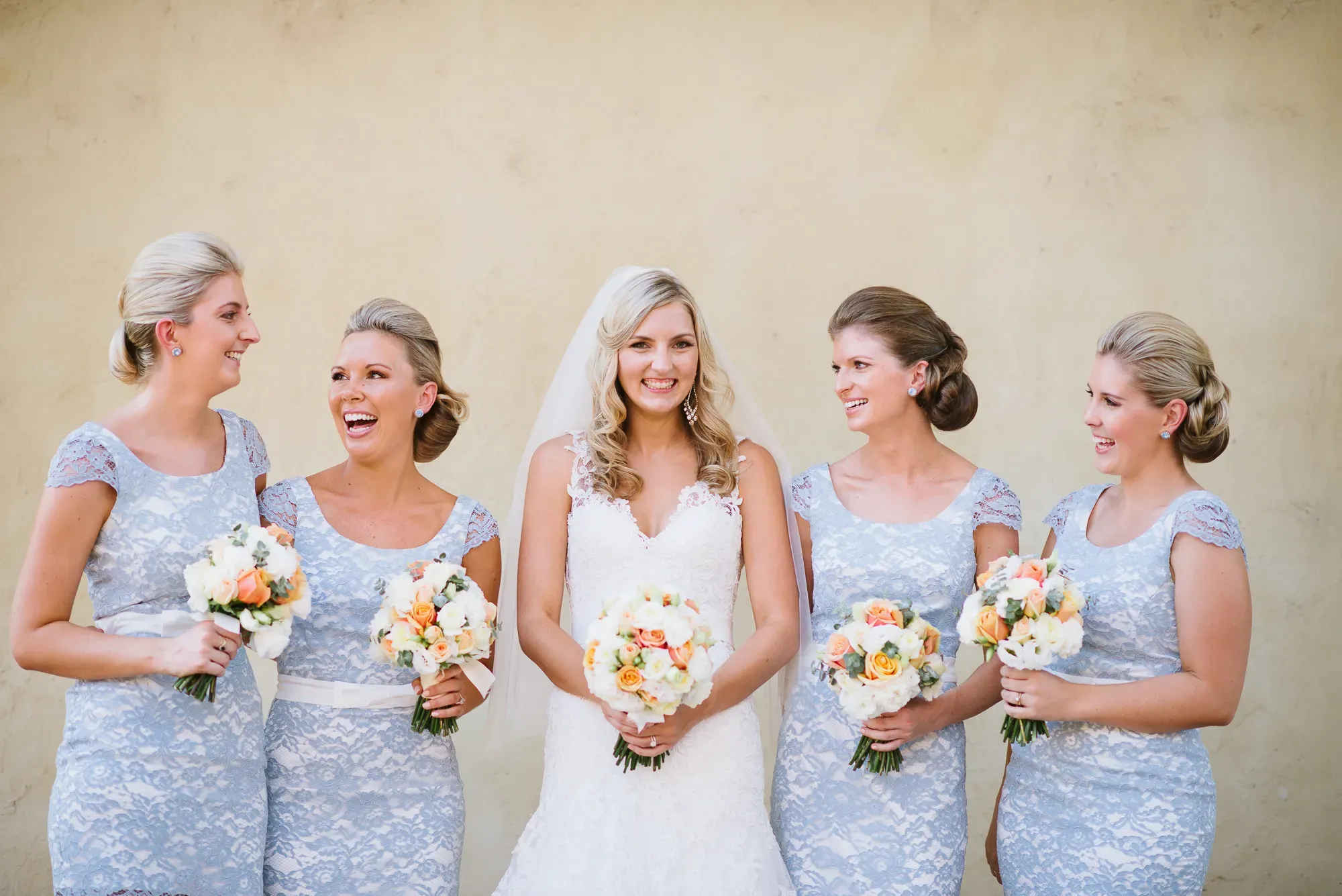Newcastle wedding hair and makeup, the bride and her bridesmaids with their bouquets