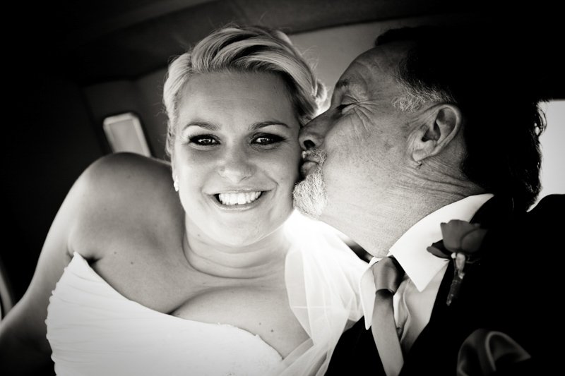Bride with father in Wedding car
